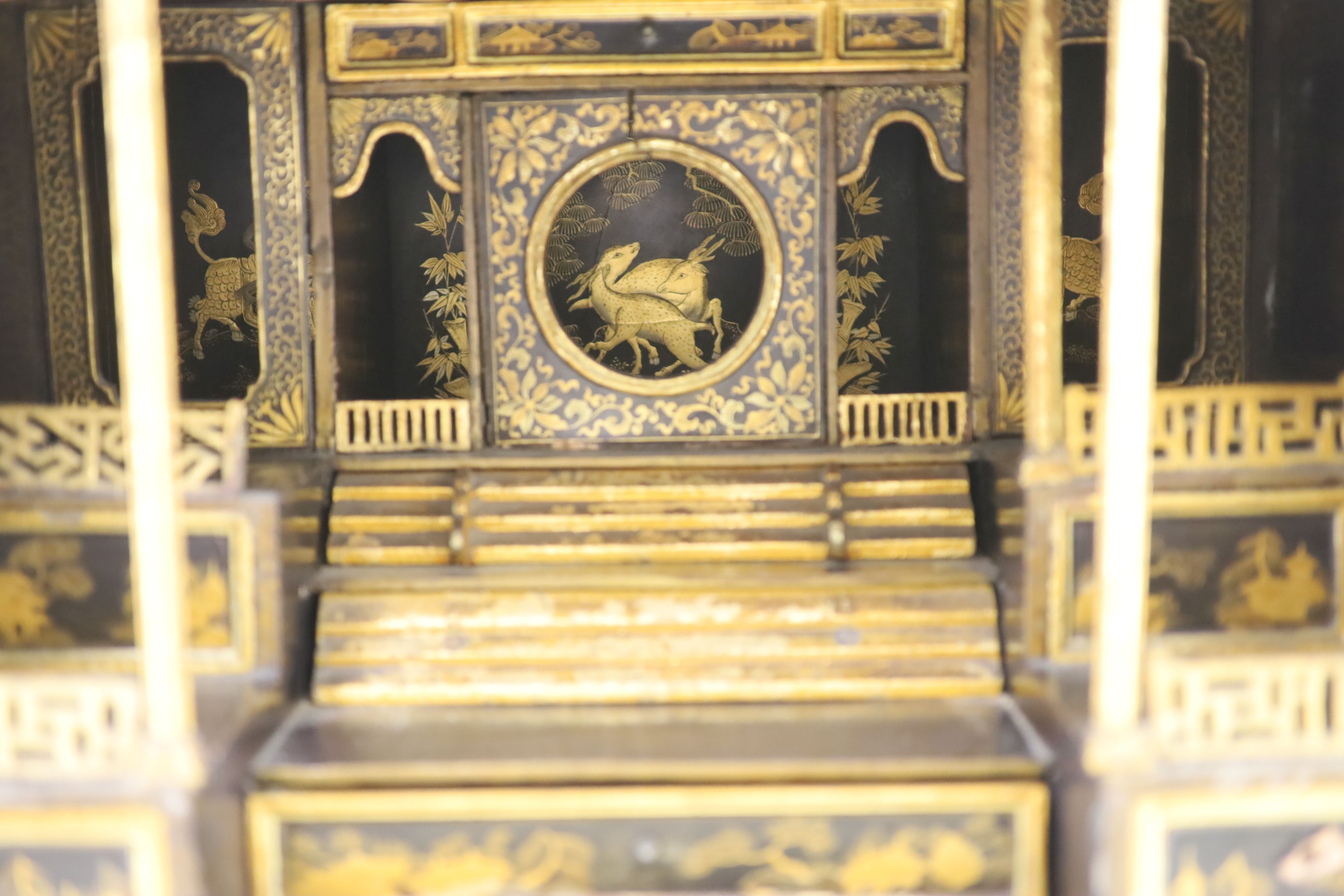 A Japanese gilt decorated black lacquer shrine cabinet, 19th century, 46cm high, 46cm wide, 38cm deep, Provenance - A. T. Arber-Cooke